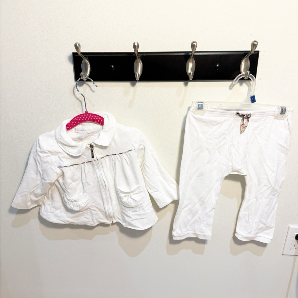 Burberry white tracksuit. Zippered sweater with a collar and drawstring pants.